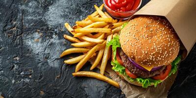 burger with fries sauce top view photo