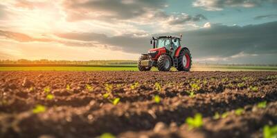 agricultural tractor working in the field photo