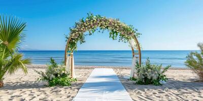 decorative wedding arch on the white sand seashore photo