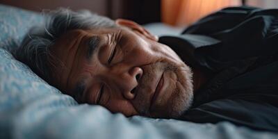 elderly man sleeping peacefully photo