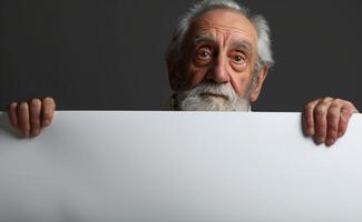 elderly woman holding a white banner in her hands photo