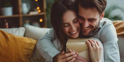 a man gives a gift in a box from his girlfriend's ribbon a man gives photo