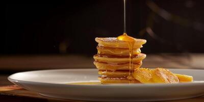 delicious pancakes with honey photo