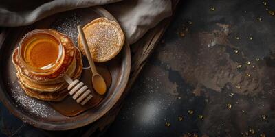 delicious pancakes with honey photo