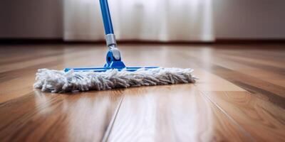 mop washes the floor close-up photo