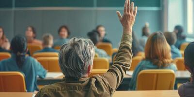 listener in the audience asks to speak by raising his hand photo