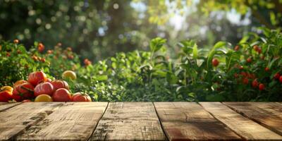 wooden table on a background of vegetable bushes photo