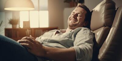 a man falls asleep on the sofa with a smile photo