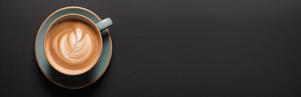 A cup of coffee on a panoramic dark background photo