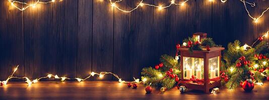 Christmas lights garlands Christmas tree on wooden table banner photo