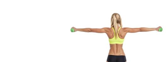 athletic girl in sports underwear with dumbbells in her hands on a white background, rear view banner photo