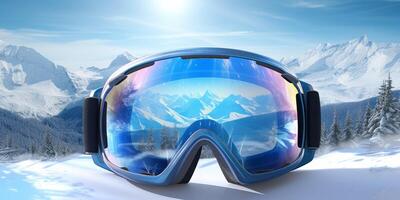 Ski goggles with mountains reflection photo