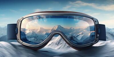 Ski goggles with mountains reflection photo