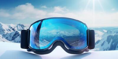 Ski goggles with mountains reflection photo