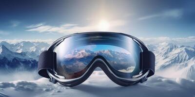 Ski goggles with mountains reflection photo