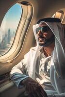 Arab businessman in a business jet photo