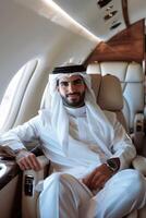 Arab businessman in a business jet photo