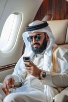 Arab businessman in a business jet photo