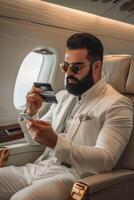 Arab businessman in a business jet photo