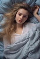 woman sleeping in bed photo