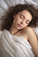 woman sleeping in bed photo