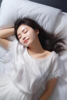 woman sleeping in bed photo