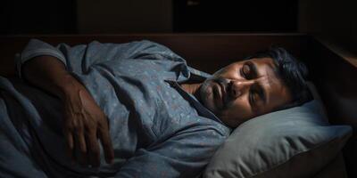 man sleeping peacefully in bed photo