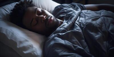 man sleeping peacefully in bed photo