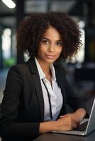 woman working at a computer in the office photo