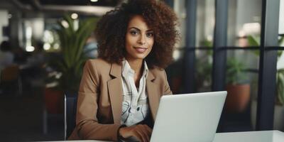 woman working at a computer in the office photo