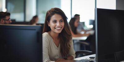 woman working at a computer in the office photo