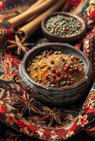 Ceramic bowl with mixed spices photo