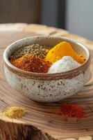 Ceramic bowl with mixed spices photo