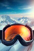 ski goggles with mountain reflection photo