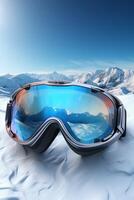 ski goggles with mountain reflection photo