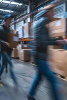 Blurred image of warehouse employees photo