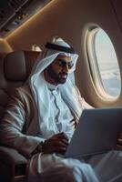 Arab businessman in a private jet photo