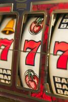 winning on Three Sevens slot machines photo