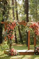 Floral wedding arch in nature photo