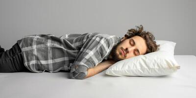 man sleeping in bed photo