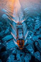 icebreaker sailing through the ice photo