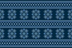 Traditional ethnic motifs ikat geometric fabric pattern cross stitch.Ikat embroidery Ethnic oriental Pixel navy blue background. Abstract,illustration. Texture,decoration,wallpaper. vector