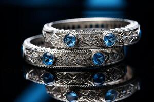 Stacked Silver Rings Topped with Blue photo