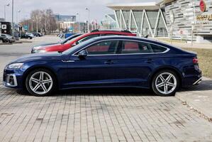 Minsk, Belarus, April 16, 2024 - Audi A5 car parked at city street. photo