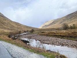 A view of the Scotland Countryside near the Glencoe Mountains photo