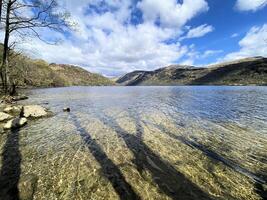 A view of Loch Lomond in Scotland on a sunny day photo