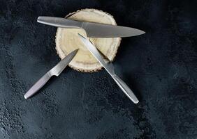 three kitchen steel knives photo