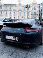 Lithuania, Vilnius, April 11, 2024 - black Porsche Carrera 911 S photo