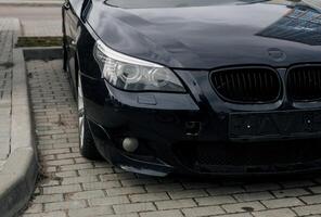 Minsk, Belarus, April 16, 2024 - car BMW without logo on parking photo