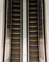 Top view of two escalators photo